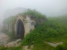 Santa Ruins in foggy weather, Gumushane, Turkey. photo