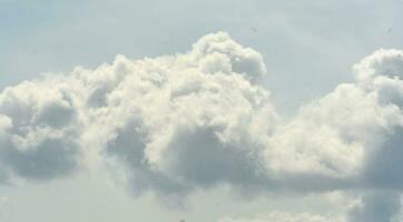 background photo of white clouds and blue sky