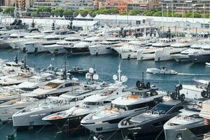 Monaco, Monte Carlo, 27 September 2022 - a lot of luxury yachts at the famous motorboat exhibition in the principality, the most expensive boats for the richest people around the world, yacht brokers photo