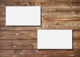 Blank business card presentation on wooden background photo