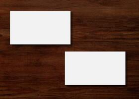 Blank business card presentation on wooden background photo