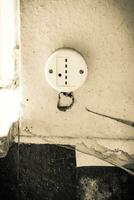 an old socket in an abandoned house photo