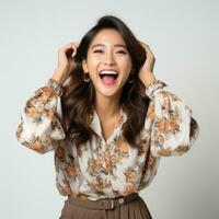 AI generated Curly optimistic woman raises palms from joy, happy to receive awesome present from someone, shouts loudly, dressed in casual t shirt, isolated on beige background. Excited female yells. photo