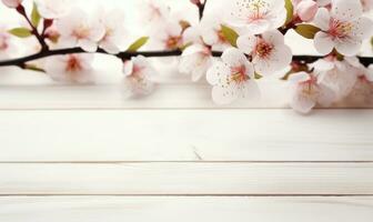 AI generated Beautiful peach tree blossoming branches on white wooden background, space for text photo