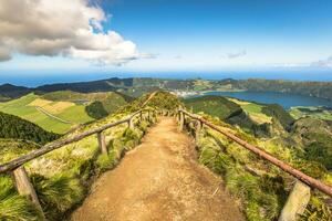 Walking path leading to a view on the lakes of Sete Cidades and Santiago in Sao Miguel, Azores photo