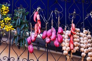 herbs and spices arranged in baskets outside a shop in Marakech, Morocco. photo