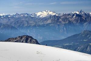 High mountains under snow in the winter photo