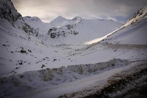 panoramic view, south side, of massif of Maladeta in the Pyrenees photo