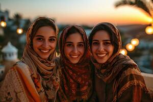 ai generado grupo de contento musulmán mujer vistiendo hijab tomando selfie con móvil teléfono a puesta de sol. generativo ai foto