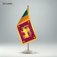 Flag of Sri Lanka hanging on a flag stand. vector