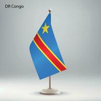 Flag of DR Congo hanging on a flag stand. vector