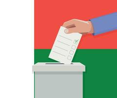 Madagascar election concept. Hand puts vote bulletin vector