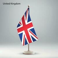 Flag of United Kingdom hanging on a flag stand. vector