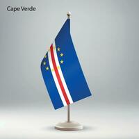 Flag of Cape Verde hanging on a flag stand. vector