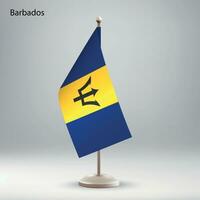 bandera de barbados colgando en un bandera pararse. vector