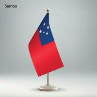 Flag of Samoa hanging on a flag stand. vector