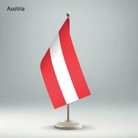 Flag of Austria hanging on a flag stand. vector