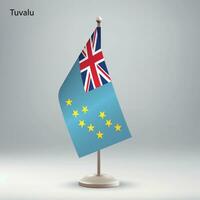 Flag of Tuvalu hanging on a flag stand. vector