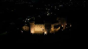 Night aerial view of Fenis castle Aosta Valley Italy video