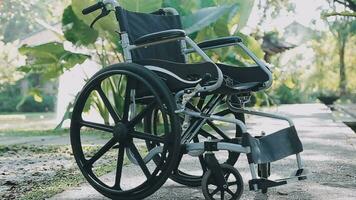 Empty wheelchairs for patients parked in the hospital. video