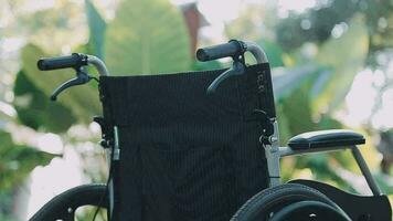 Empty wheelchairs for patients parked in the hospital. video