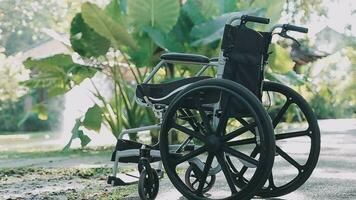 Empty wheelchairs for patients parked in the hospital. video