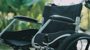 Empty wheelchairs for patients parked in the hospital. video