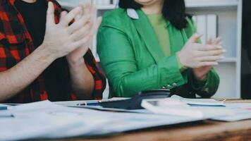 Business people clapping hands in conference, celebrating success and showing support at a training seminar for work. Closeup of colleagues giving applause, motivation and appreciation at a workshop video