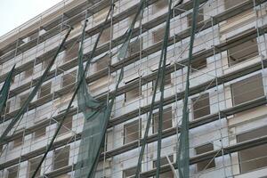 house under construction . Windows without glass photo