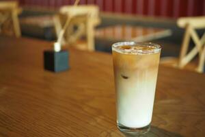 iced late in a transparent glass on cafe table outdoor photo