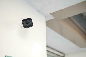 CCTV security camera operating outdoor photo