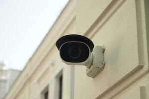 CCTV security camera operating outdoor photo