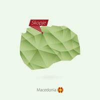 Green gradient low poly map of Macedonia with capital Skopje vector