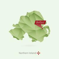 Green gradient low poly map of Northern Ireland with capital Belfast vector