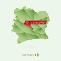 Green gradient low poly map of Ivory Coast with capital Yamoussoukro vector