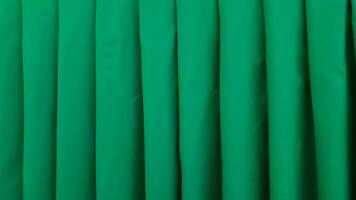 green textile texture background wallpaper pattern fabric material design fashionable elegant backdrop surface wave luxury art modern light grunge grapery beautiful curve velvet curtain satin green photo