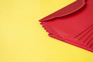 Side view of yellow envelopes on yellow cover with customizable space for text. photo