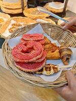 Image of choosing bread in a bakery photo