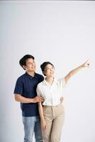 Image of an Asian couple posing on a white background photo