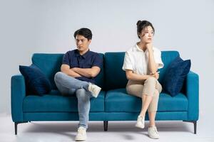 Image of an Asian couple posing on a white background photo