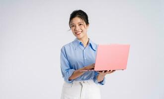 Portrait of young Asian businesswoman, isolated on white background photo