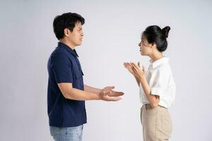 Image of an Asian couple posing on a white background photo