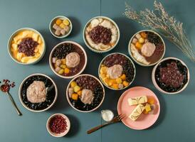 Pearl Bean, Double Tofu Curd, Taro Ball, Beancurd, Panna Cotta, Pudding, Red Bean Soup, served in bowl isolated on background top view of taiwan food photo
