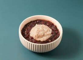 Taro Red Bean Soup served in bowl isolated on background top view of taiwan food photo