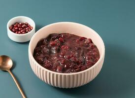 Pure Red Bean Soup served in bowl isolated on background top view of taiwan food photo