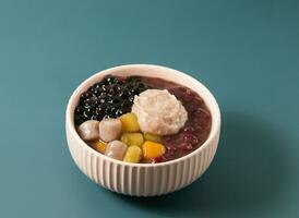 Signature Double Taro Red Bean Soup served in bowl isolated on background top view of taiwan food photo