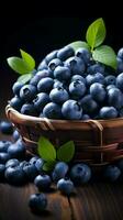 AI generated fresh blue berries in a basket on wooden background Vertical Mobile Wallpaper photo