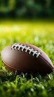 AI generated American football closeup, vibrant green field, ideal for customized text Vertical Mobile Wallpaper photo