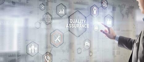 QA Businessman pressing Quality assurance button on virtual screens photo