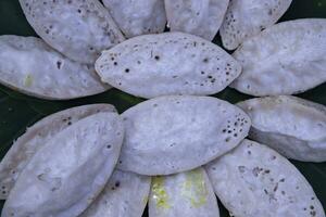 Bangladeshi Traditional Aush or Porangi Rice Special  Delicious hand-made Chitoi Pitha Decorated Closeup Focus photo